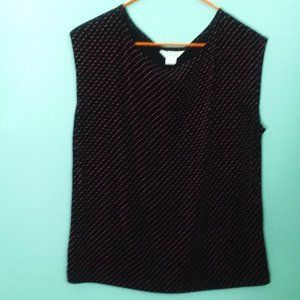 Black sleeveless top with coral-colored dots